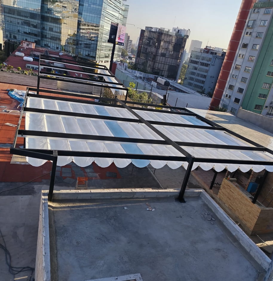 Cubierta tipo palillería en penthouse de edificio residencial - DIDANF